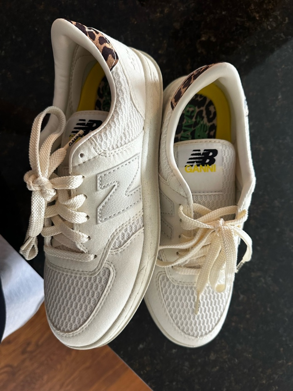 New Balance Cream White Sneakers with Leopard Heel Accent